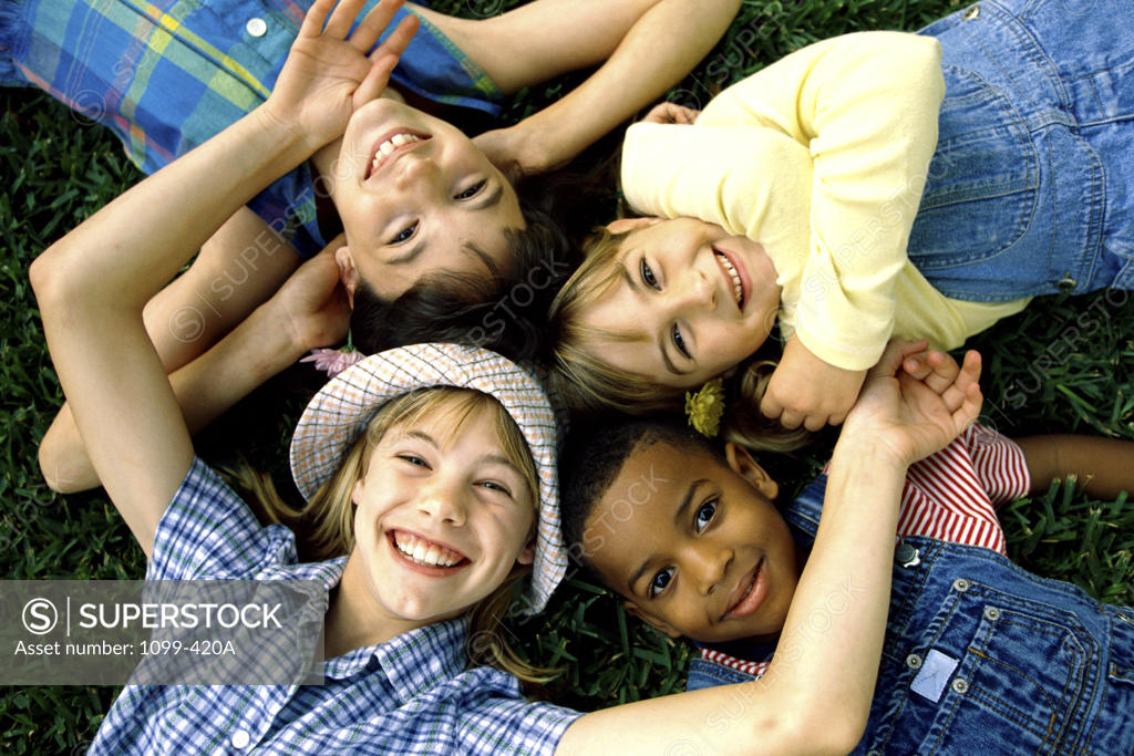 Stock Photo: 1099-420A Portrait of a group of children lying down