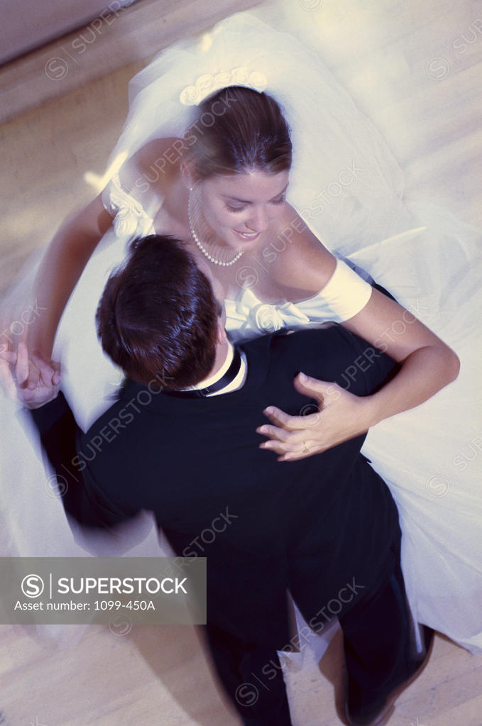 Stock Photo: 1099-450A High angle view of a newlywed couple dancing