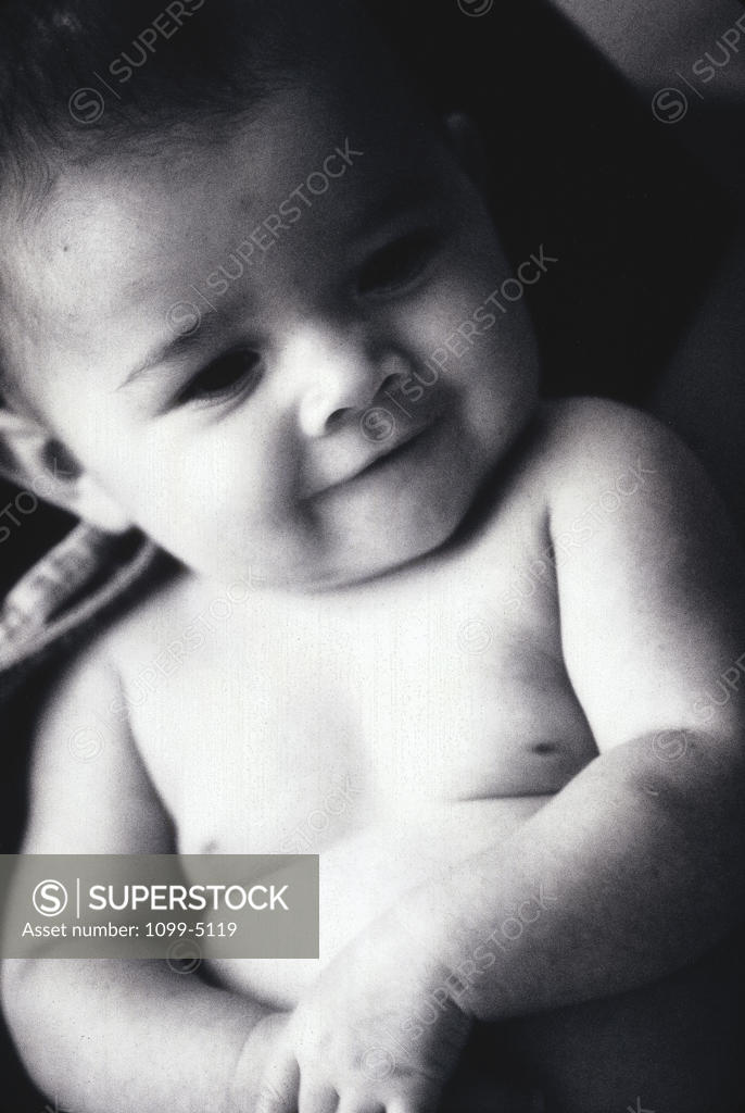 Stock Photo: 1099-5119 Close-up of a baby boy smiling