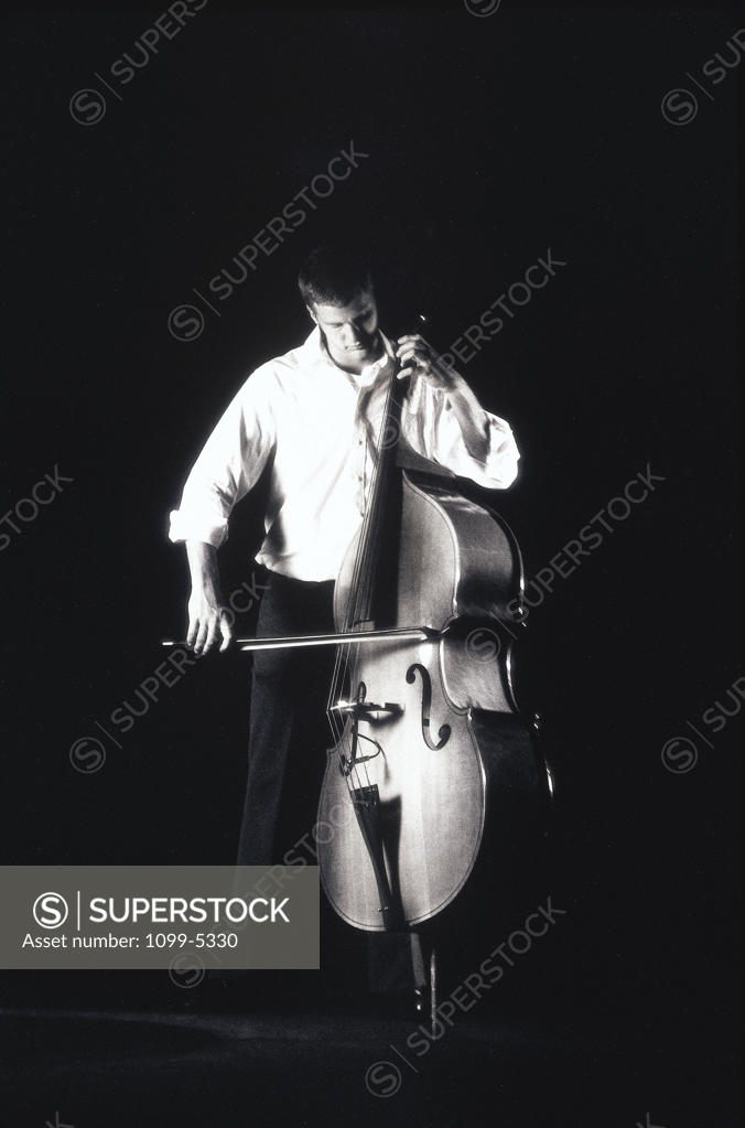Stock Photo: 1099-5330 Young man playing the cello