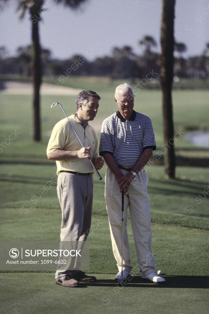 Stock Photo: 1099-6632 Two men on a golf course