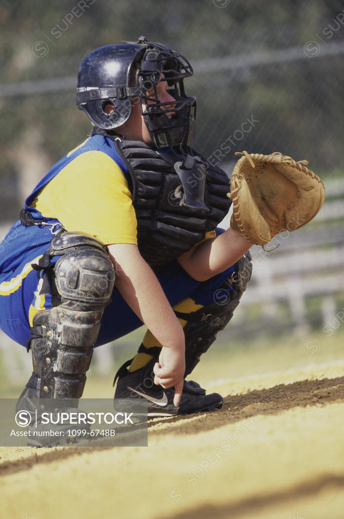 Stock Photo: 1099-6748B Boy playing baseball