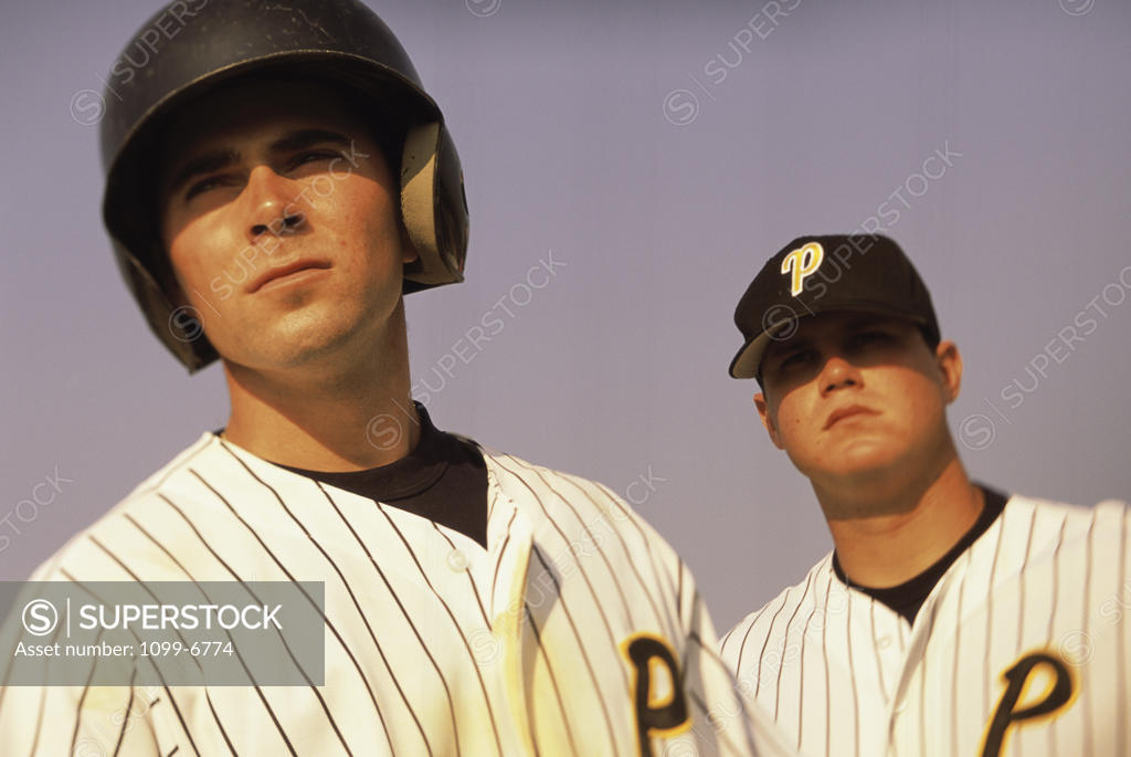 Stock Photo: 1099-6774 Low angle view of two baseball players