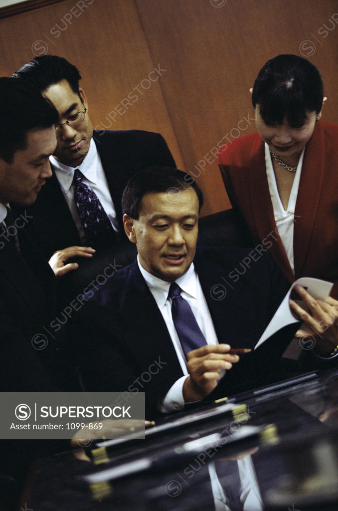 Stock Photo: 1099-869 Group of business executives in an office