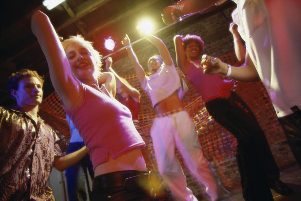 Group of people dancing at a nightclub