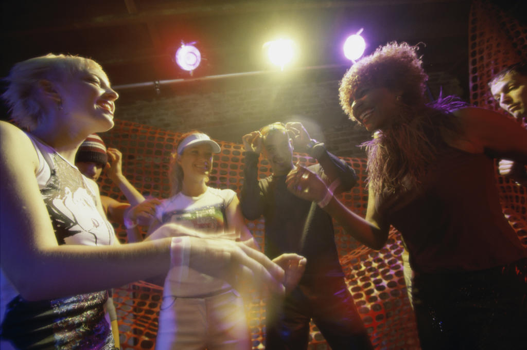 Group of people dancing at a nightclub