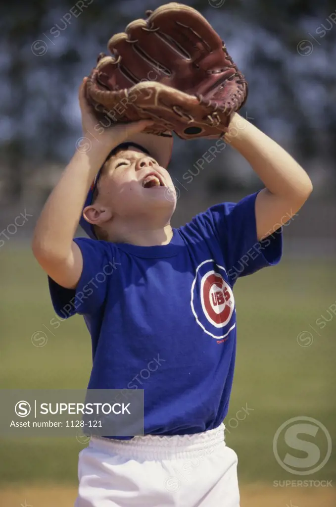 Close-up of a boy playing baseball