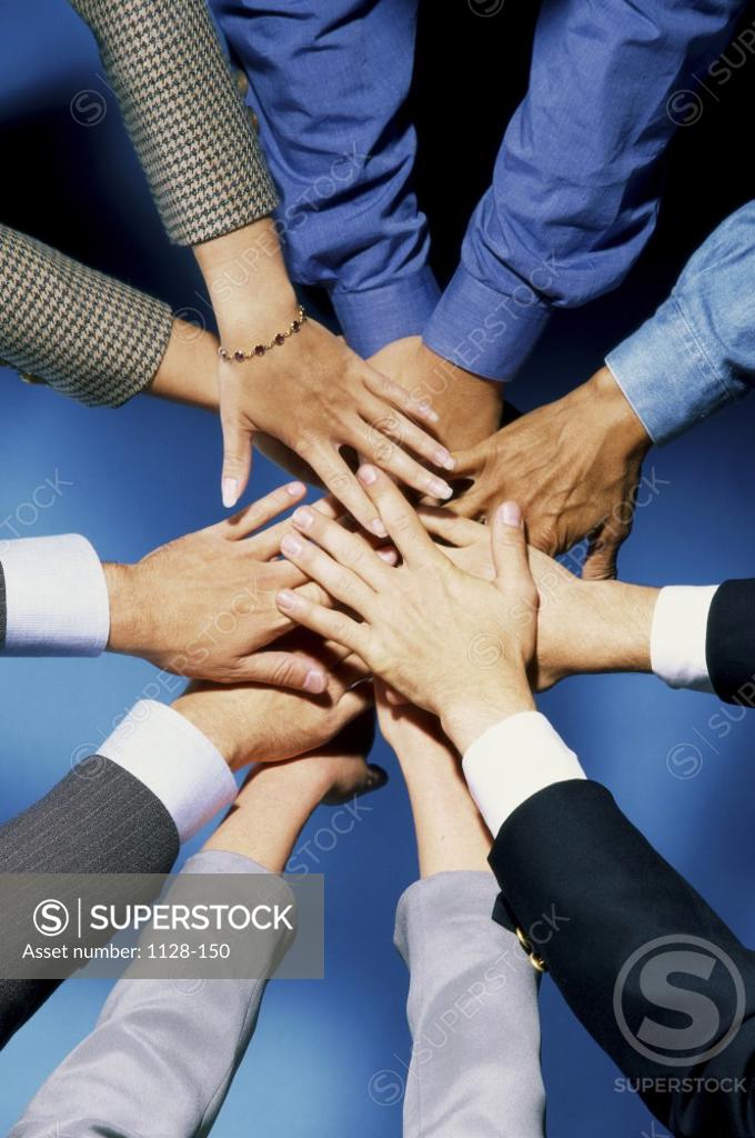 Stock Photo: 1128-150 People's hands stacked one on top of the other