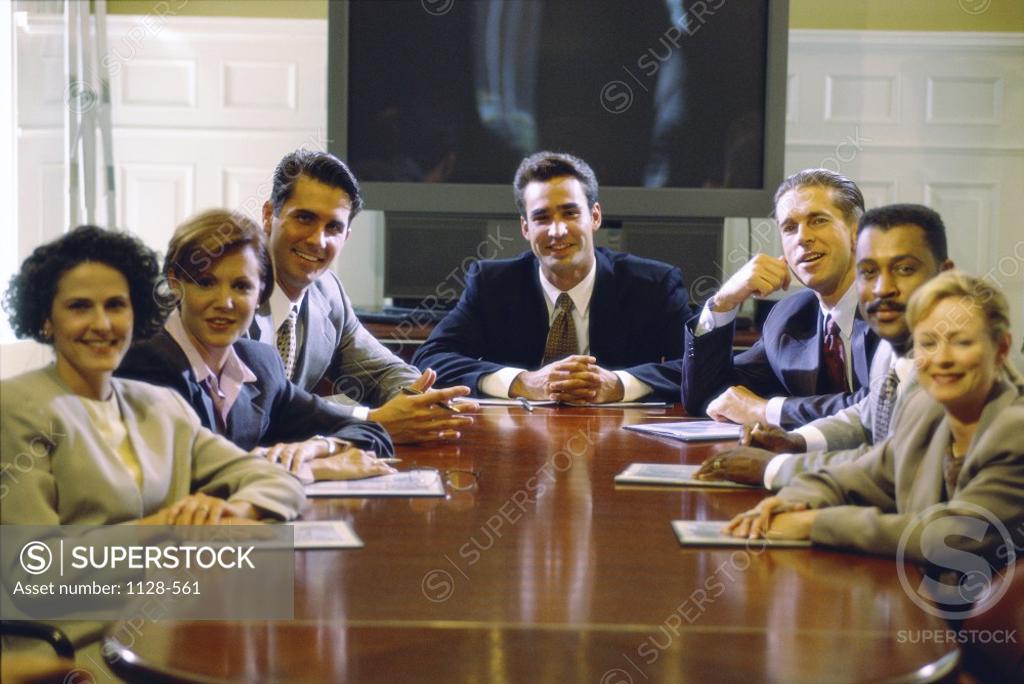 Stock Photo: 1128-561 Group of business executives in a meeting