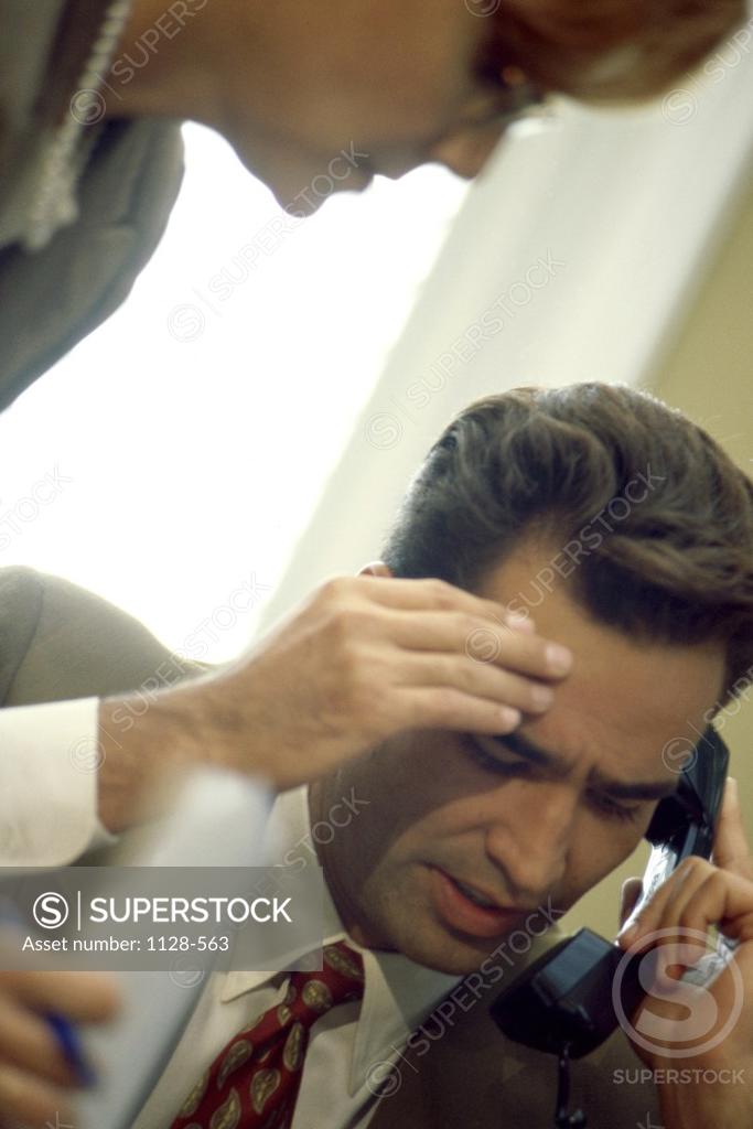 Stock Photo: 1128-563 Businessman talking on the telephone