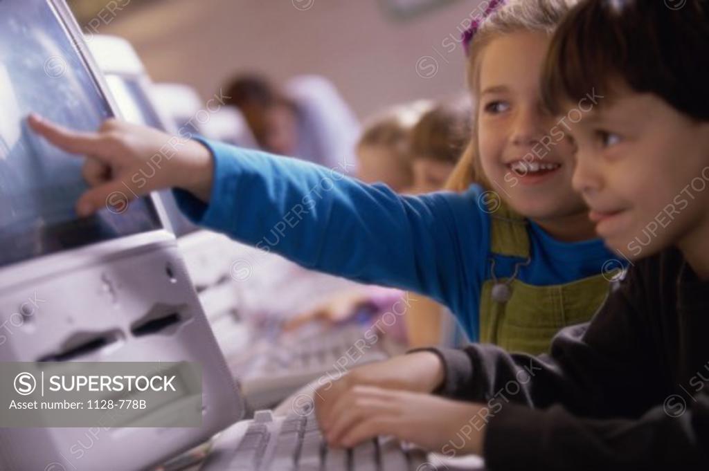 Stock Photo: 1128-778B Children in front of a computer