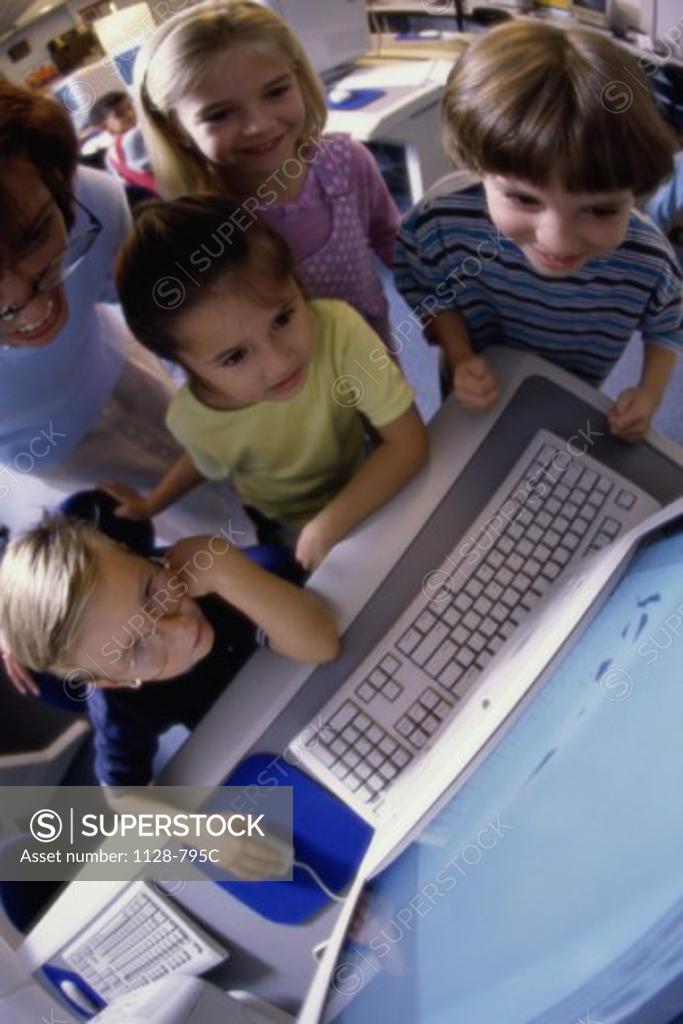 Stock Photo: 1128-795C Children in front of a computer