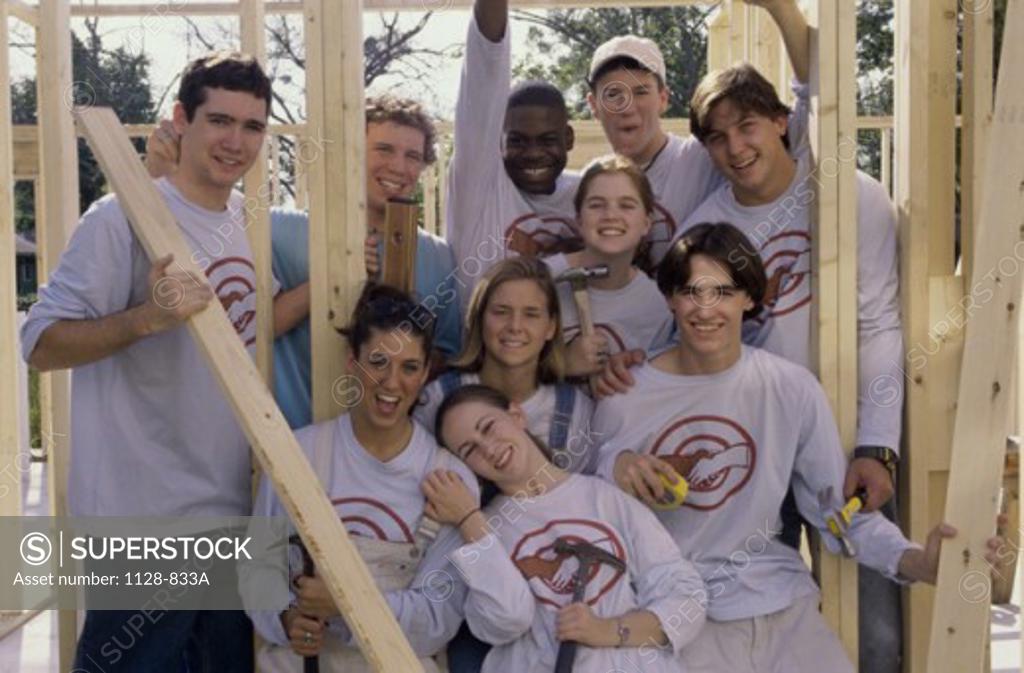 Stock Photo: 1128-833A Portrait of a group of young people at a construction site
