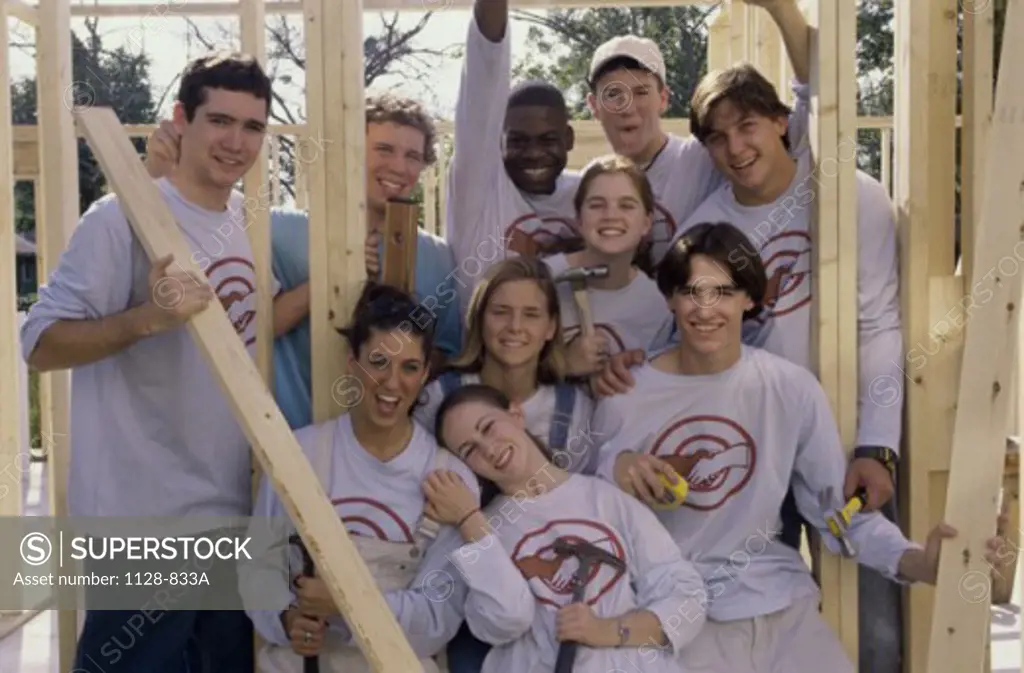Portrait of a group of young people at a construction site