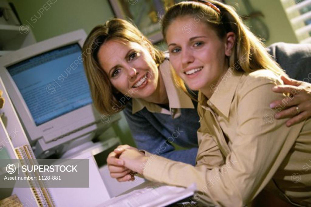 Stock Photo: 1128-881 Portrait of a mid adult woman with her daughter