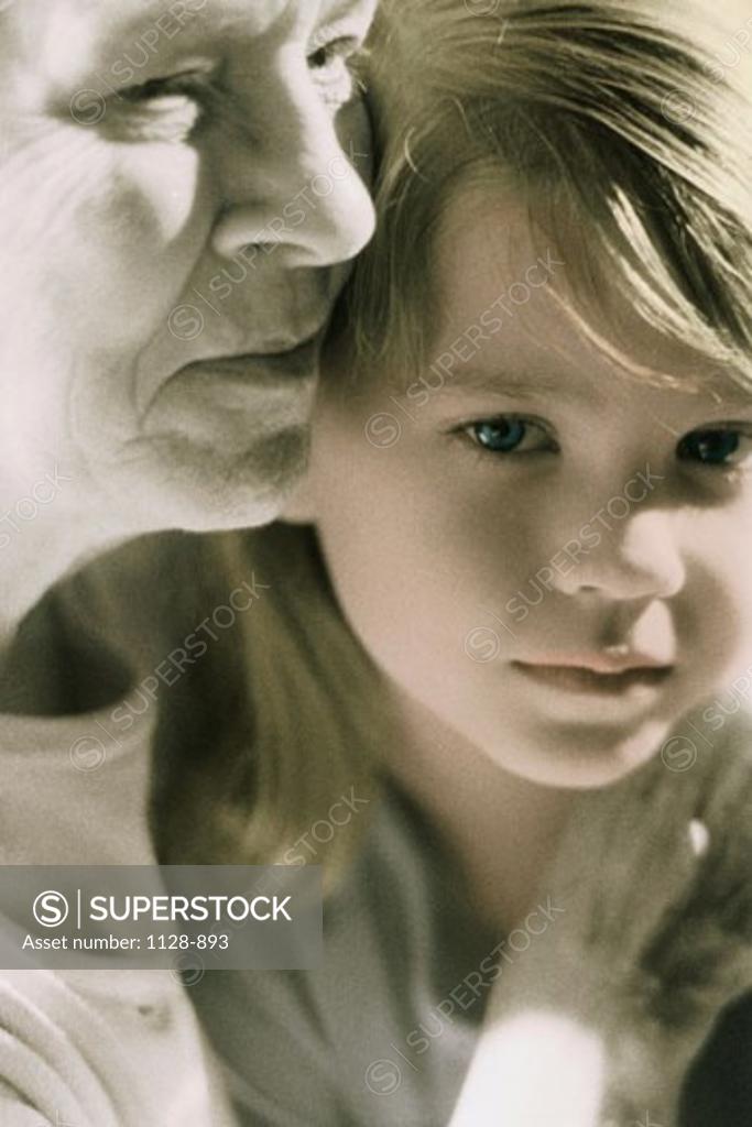Stock Photo: 1128-893 Close-up of child and a woman