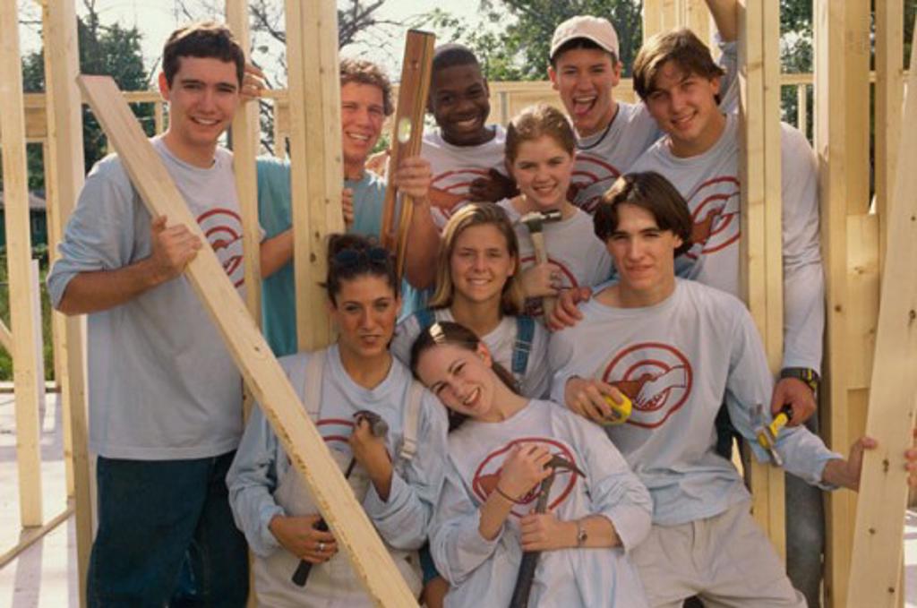 Group of young people at a construction site