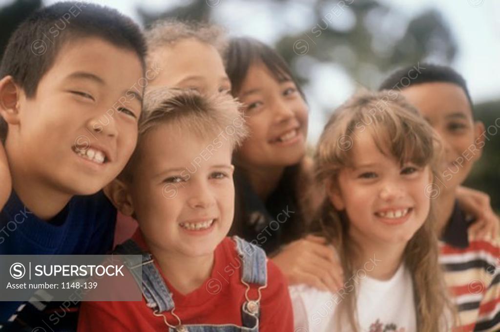 Stock Photo: 1148-139 Close-up of a group of boys and girls smiling