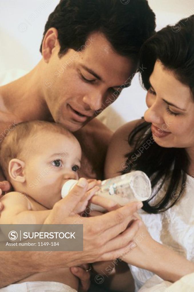 Stock Photo: 1149-184 Parents looking at their baby boy