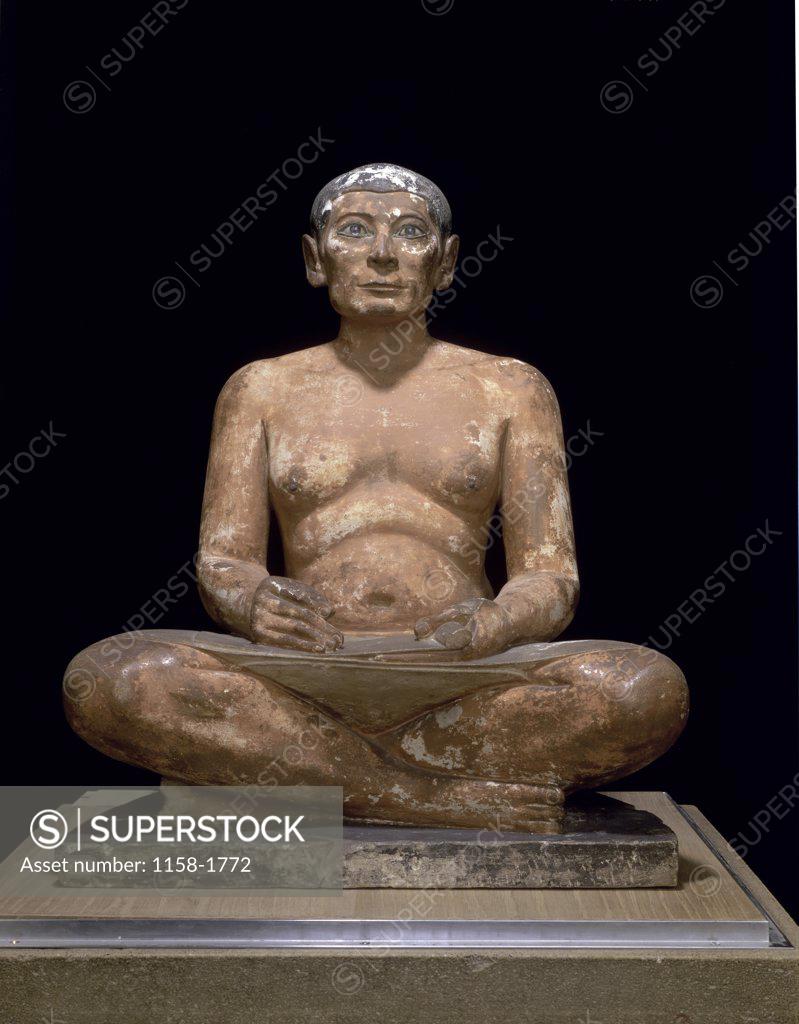 Stock Photo: 1158-1772 Statue of a Scribe  Egyptian Art  Musee du Louvre, Paris 
