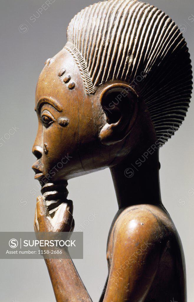 Stock Photo: 1158-2686 Masculine Figure, wood, African Art