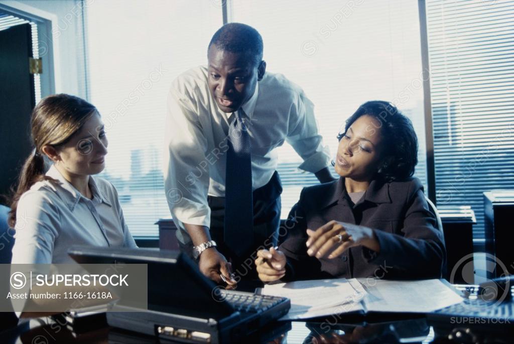 Stock Photo: 1166-1618A Business executives in a meeting
