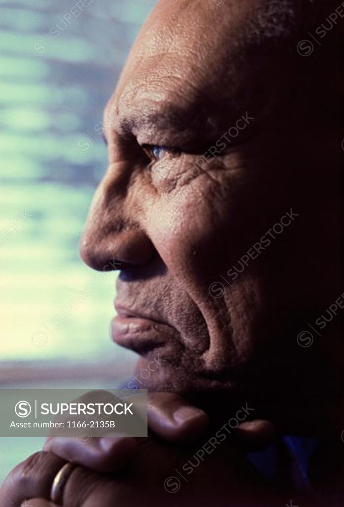 Stock Photo: 1166-2135B Close-up of a senior man looking serious