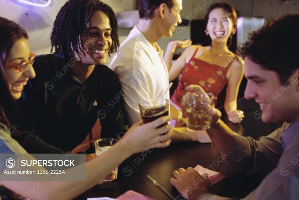 Stock Photo: 1166-2225A Group of young people at a party