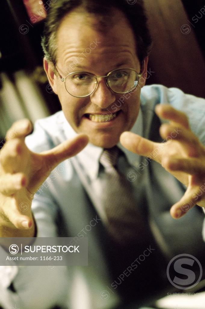 Stock Photo: 1166-233 Portrait of an aggressive businessman