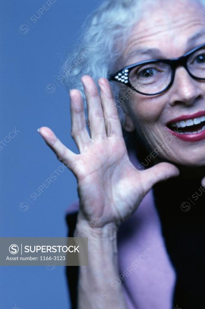 Stock Photo: 1166-3123 Portrait of a senior woman smiling