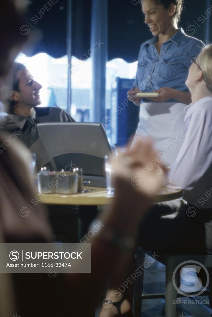 Stock Photo: 1166-3347A Business executives sitting in a restaurant