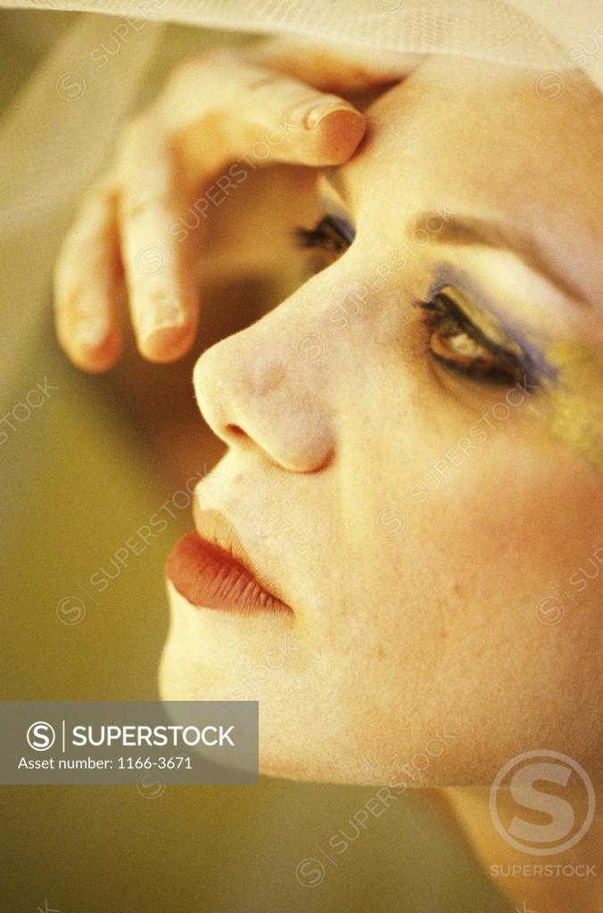 Stock Photo: 1166-3671 Close-up of a mid adult woman