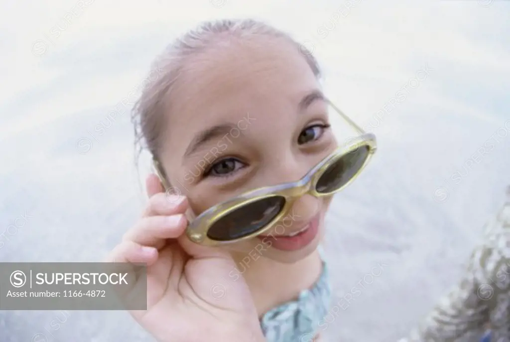 Portrait of a girl wearing sunglasses