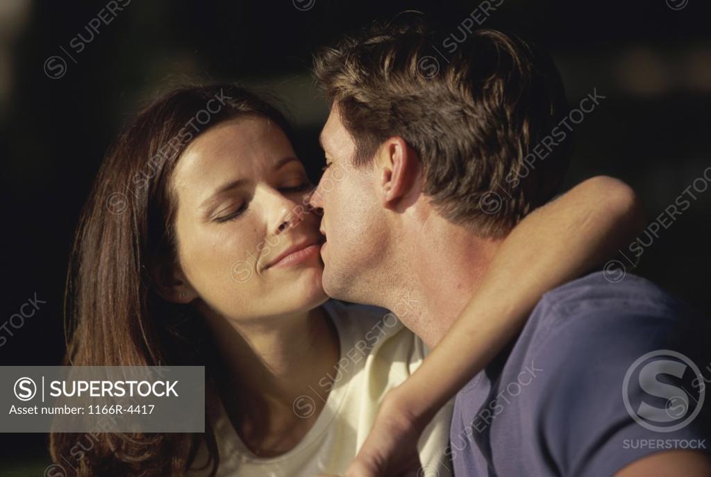 Stock Photo: 1166R-4417 Close-up of a young couple looking at each other