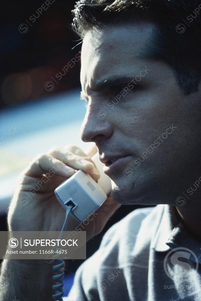 Stock Photo: 1166R-4675 Close-up of a businessman on the telephone