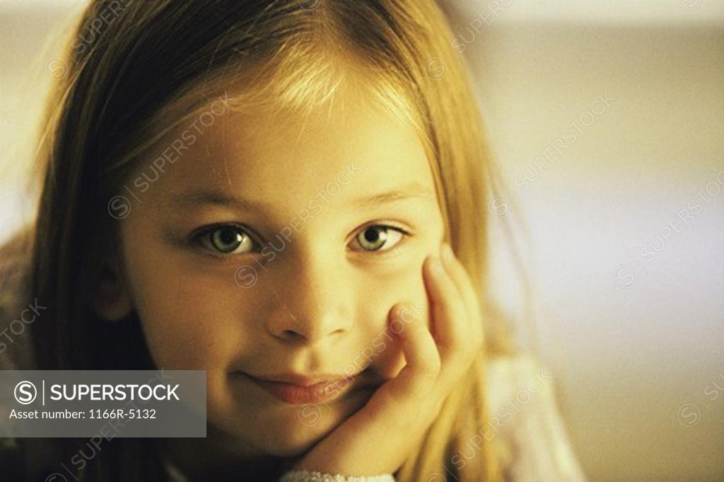 Stock Photo: 1166R-5132 Portrait of a girl with her hand on her chin