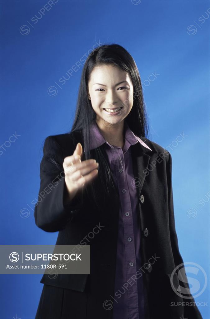 Stock Photo: 1180R-591 Portrait of a businesswoman pointing