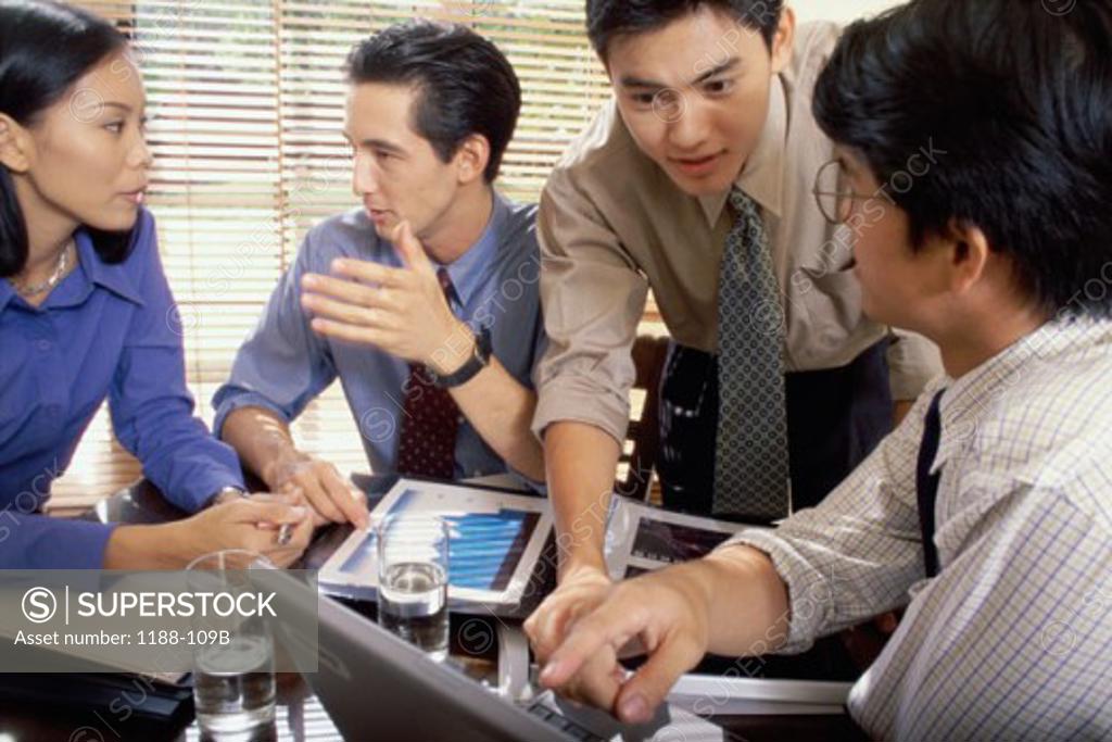 Stock Photo: 1188-109B Business executives in a meeting