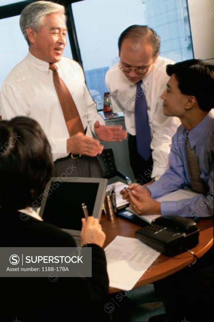 Stock Photo: 1188-178A Business executives in a meeting