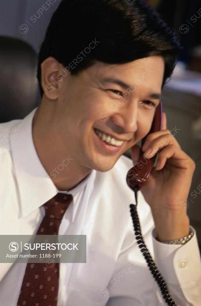 Stock Photo: 1188-199 Close-up of a businessman talking on the telephone