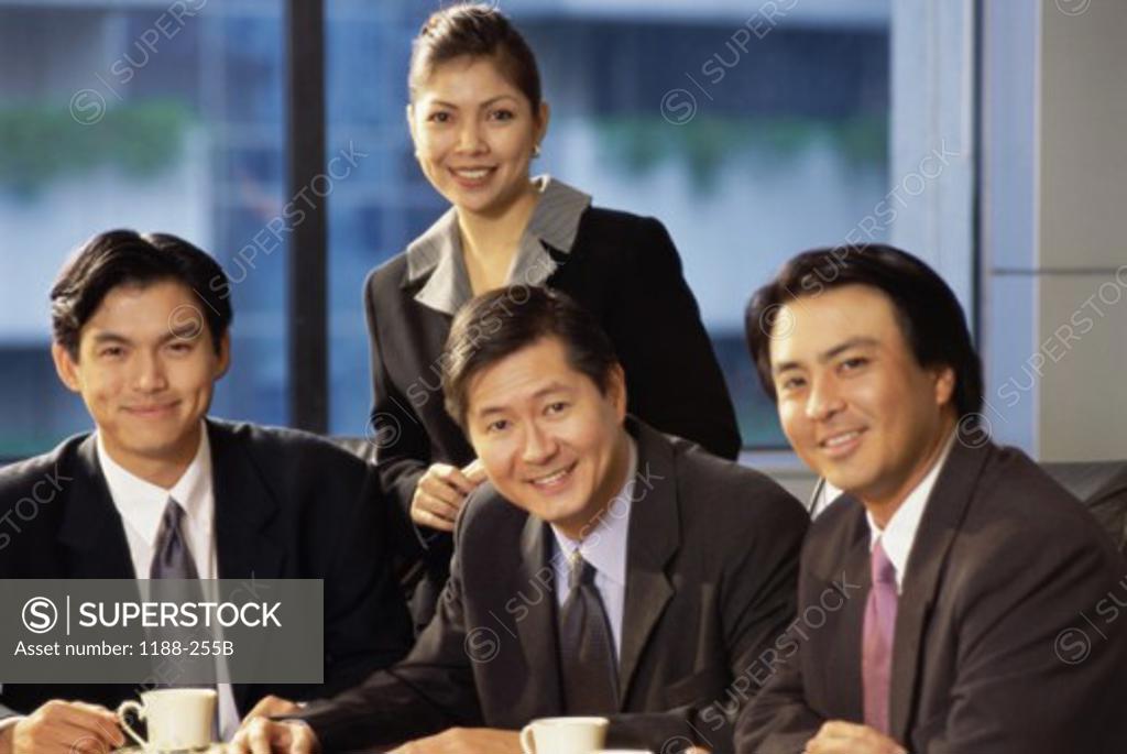 Stock Photo: 1188-255B Portrait of three businessmen smiling