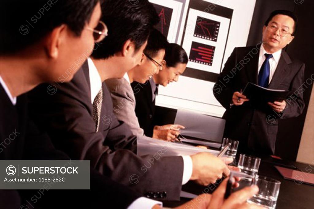 Stock Photo: 1188-282C Businessman giving a presentation in a conference room