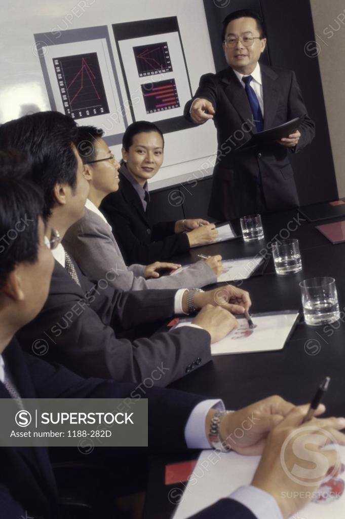 Stock Photo: 1188-282D Group of business executives in a meeting