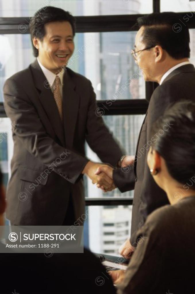 Stock Photo: 1188-291 Two businessmen shaking hands