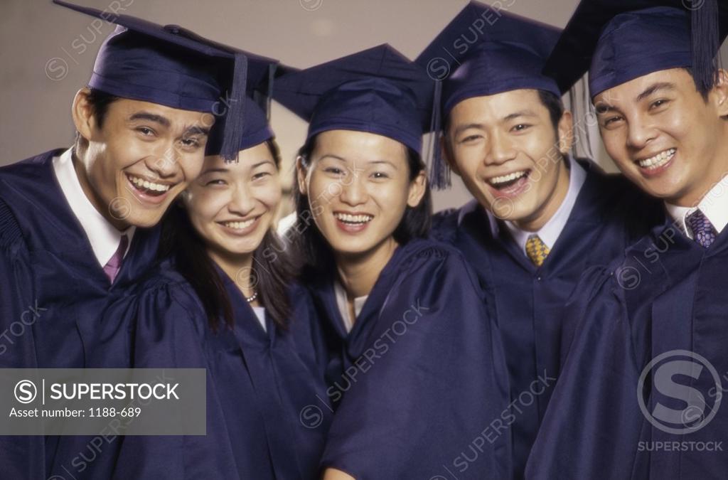 Stock Photo: 1188-689 Group of young graduates smiling