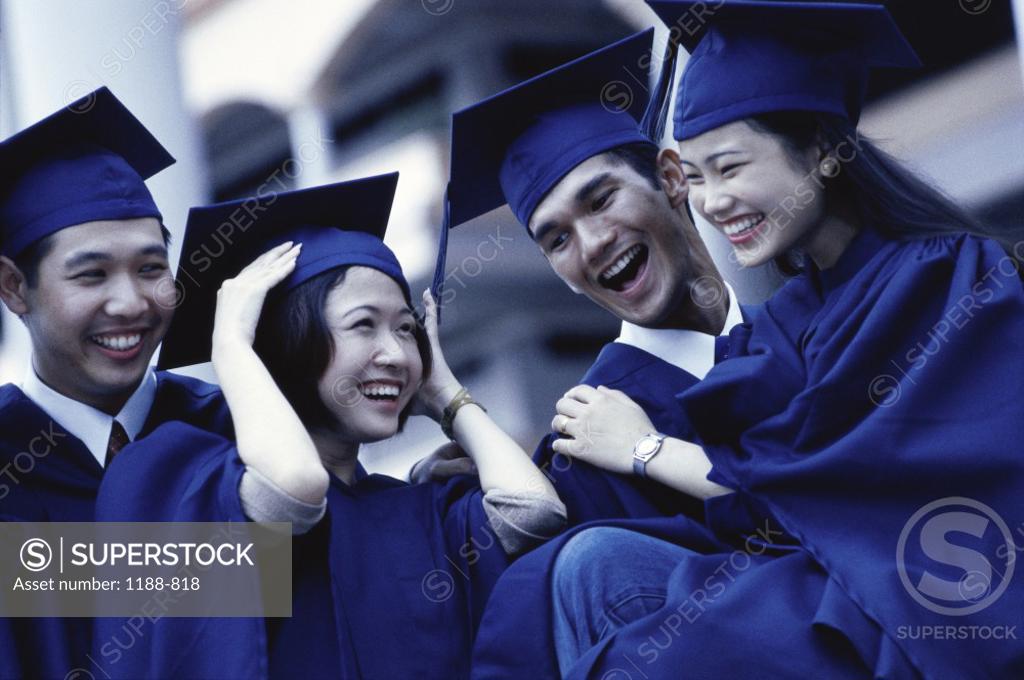 Stock Photo: 1188-818 Group of young graduates smiling