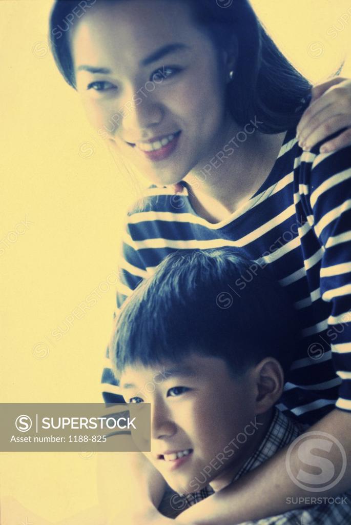 Stock Photo: 1188-825 Mother standing with her son