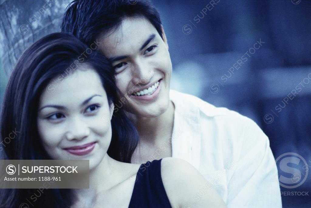 Stock Photo: 1188-961 Young couple holding each other