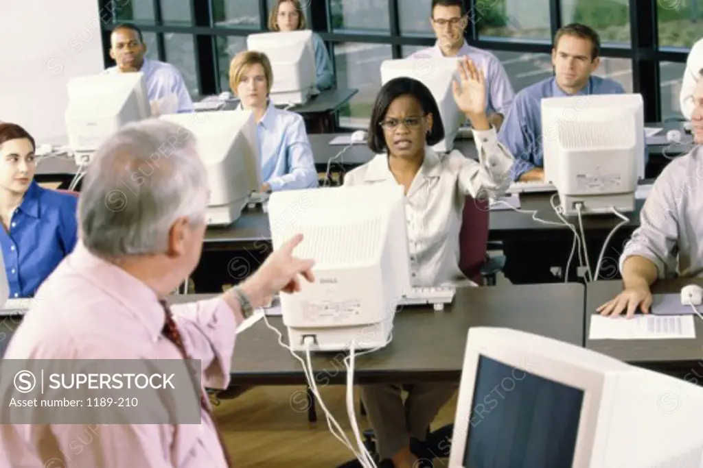 Group of business executives in a computer class
