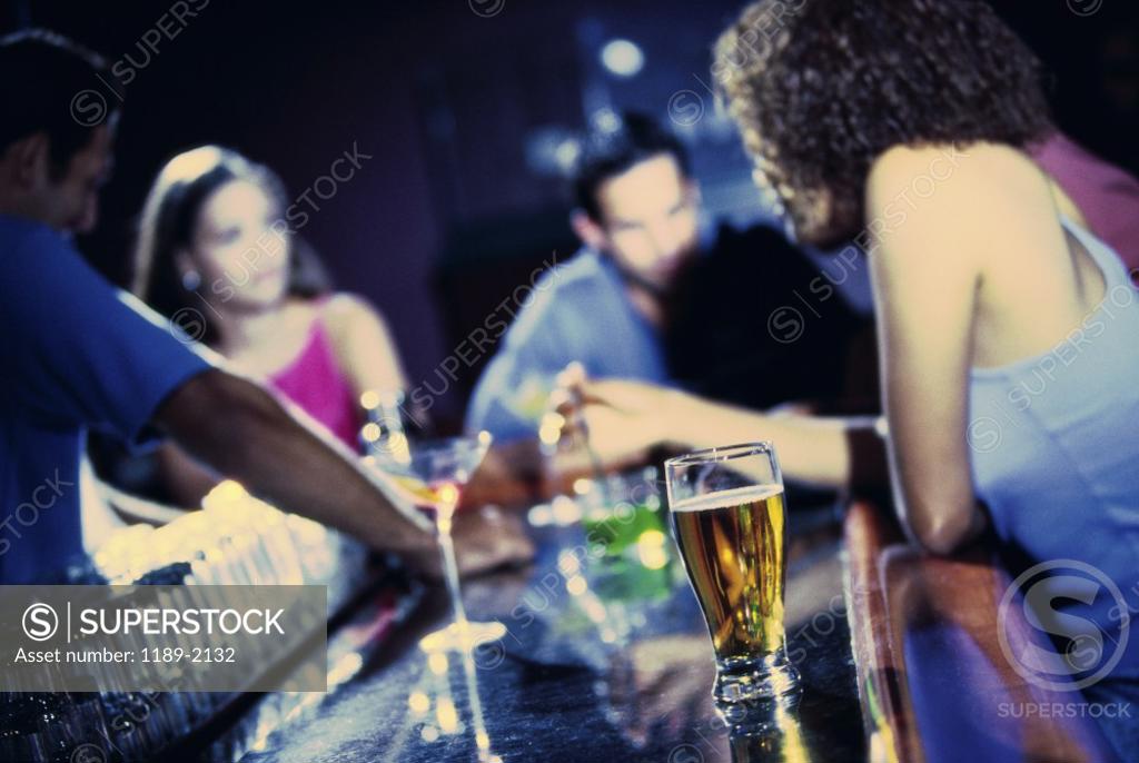 Stock Photo: 1189-2132 Group of young people in a bar